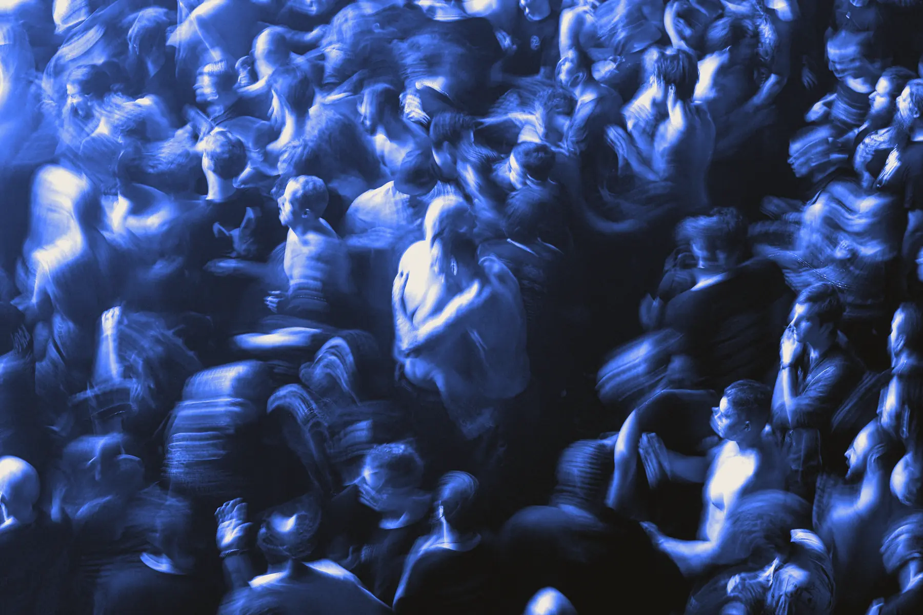 Dense concert crowd, graded blue